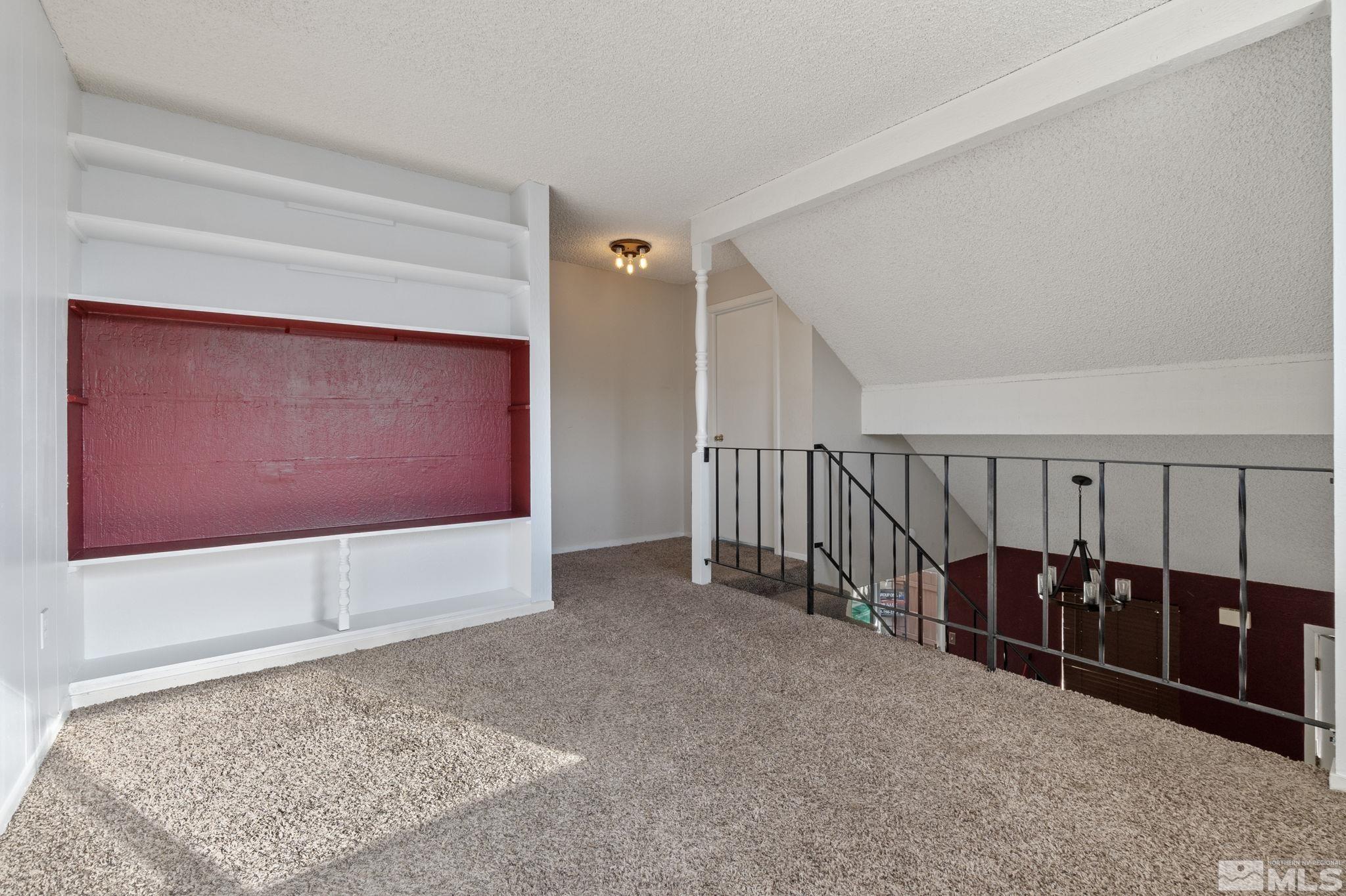 68 Condor Circle Carson City, NV 89701 - Photo 23 of 33 a view of a hallway with stairs