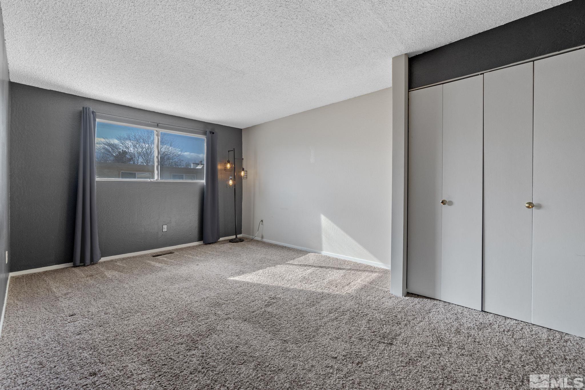 68 Condor Circle Carson City, NV 89701 - Photo 26 of 33 an empty room with windows