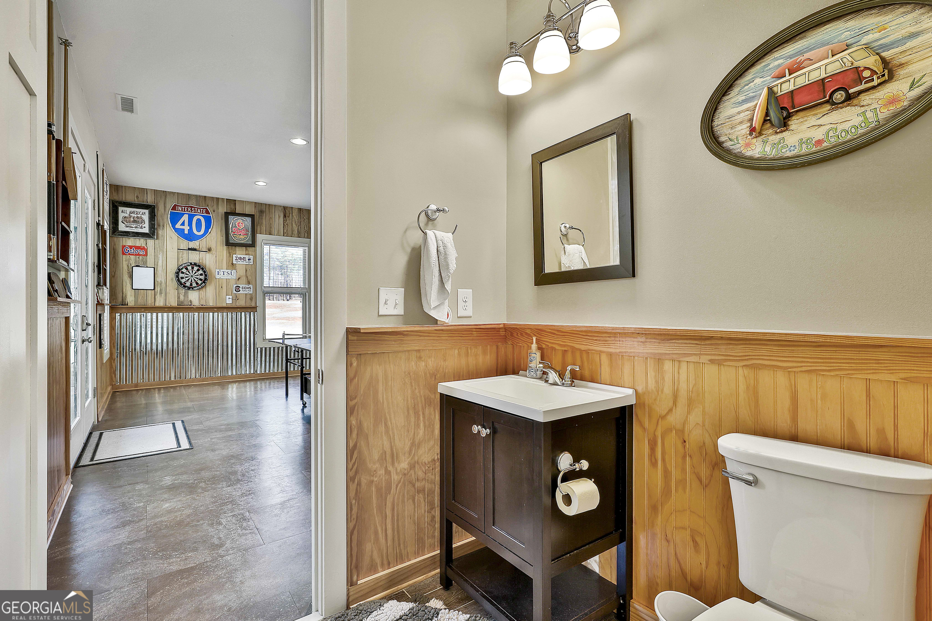 2161 Bear Creek Road Moreland, GA 30259 - Photo 107 of 137 a bathroom with a toilet a sink and a mirror