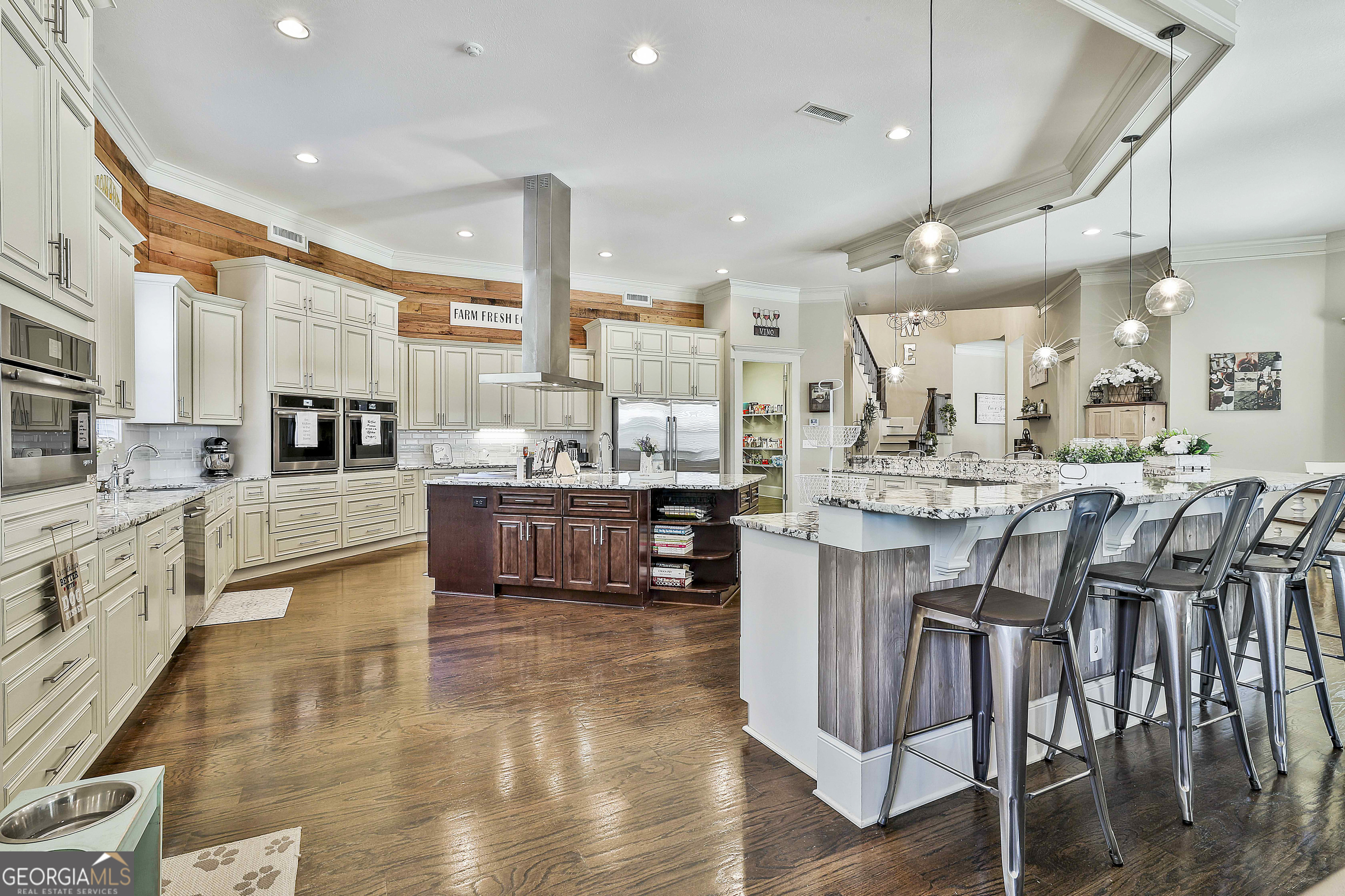 2161 Bear Creek Road Moreland, GA 30259 - Photo 39 of 137 a large kitchen with a table and chairs