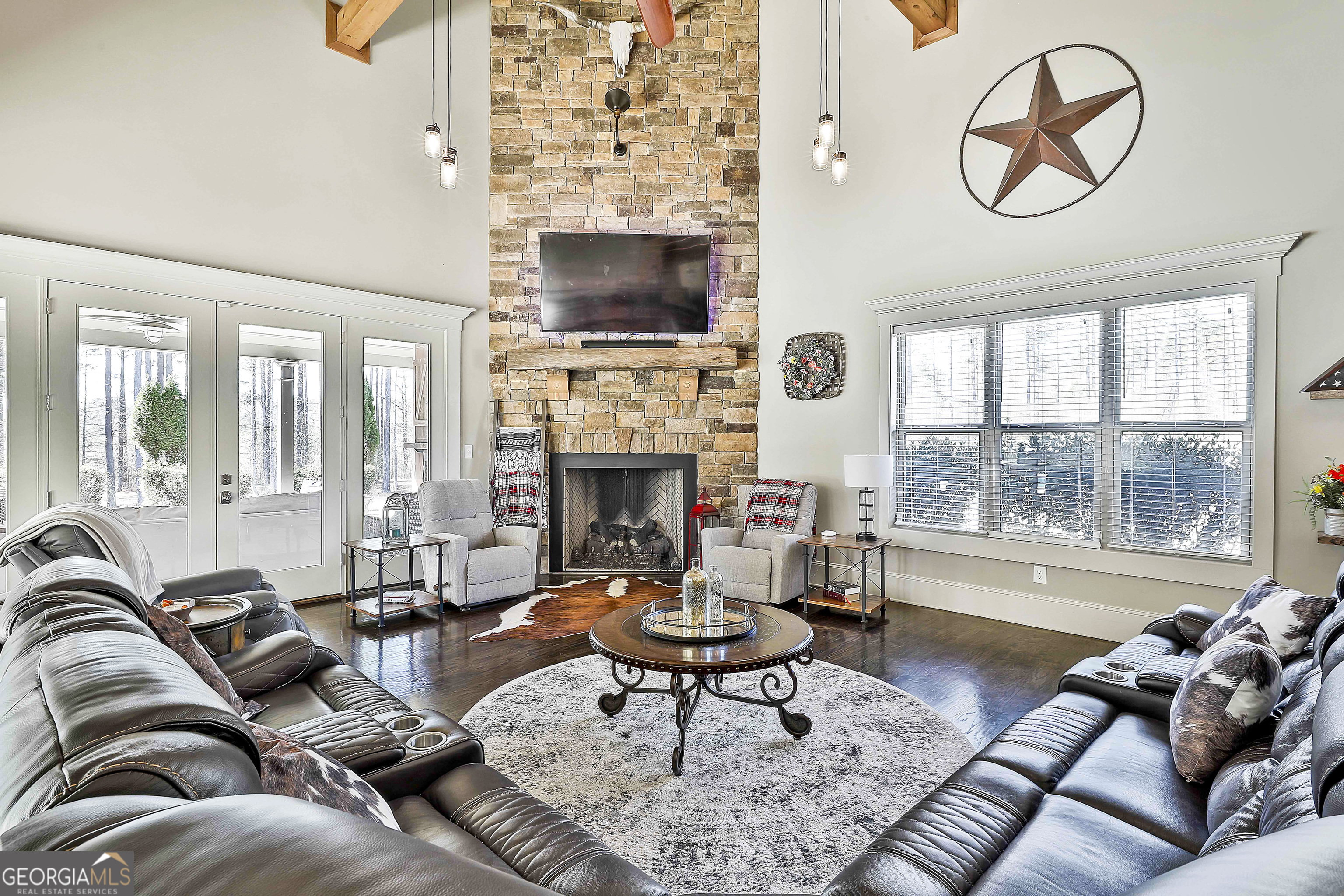 2161 Bear Creek Road Moreland, GA 30259 - Photo 43 of 137 a living room with furniture fireplace and a large window