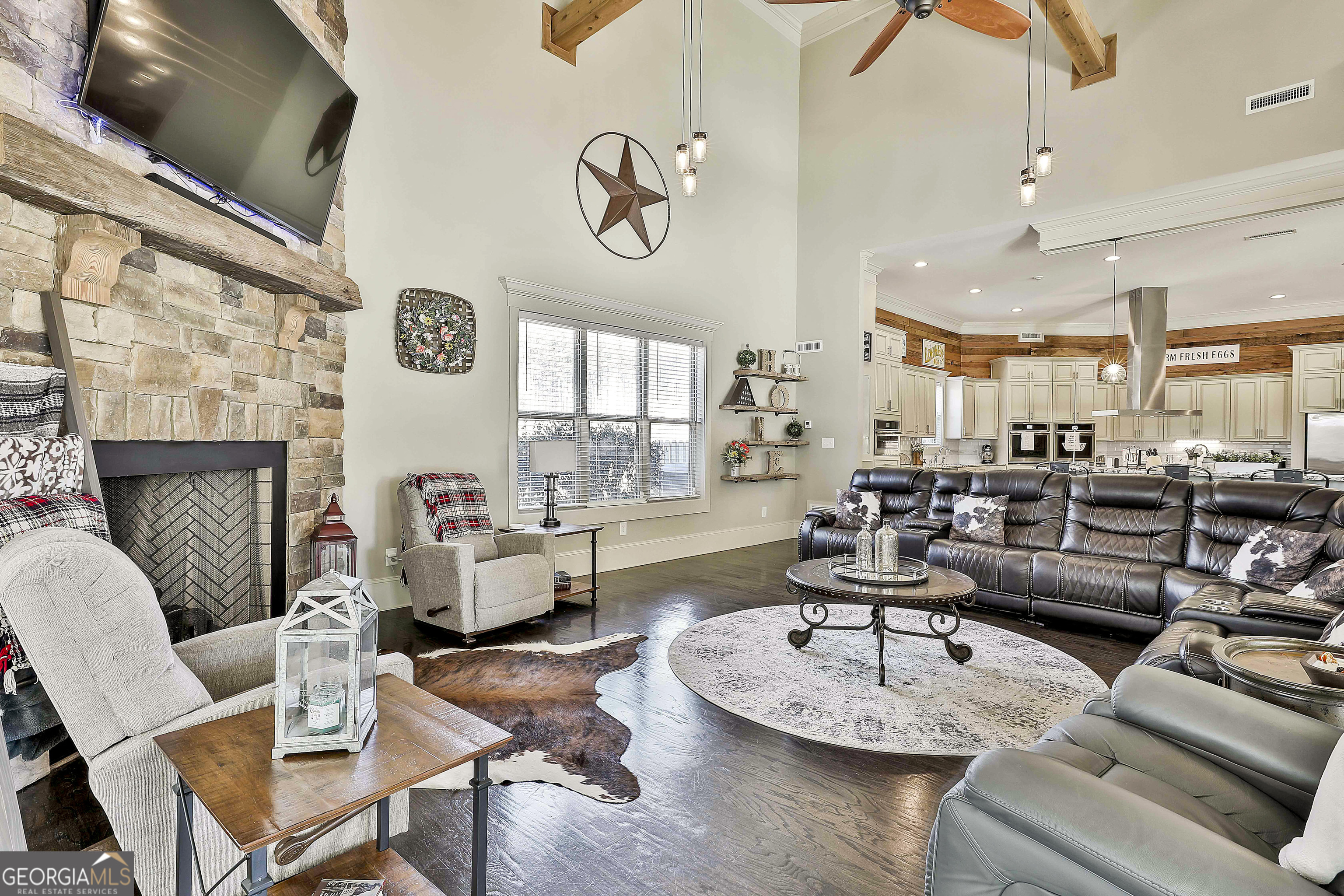 2161 Bear Creek Road Moreland, GA 30259 - Photo 44 of 137 a living room with furniture and a fireplace