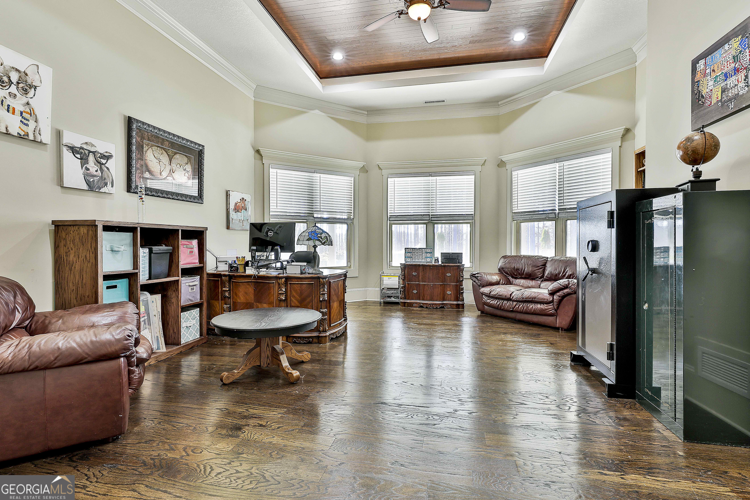 2161 Bear Creek Road Moreland, GA 30259 - Photo 63 of 137 a living room with furniture and a wooden floor