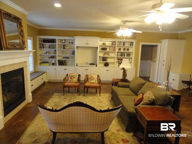 3 Patrice Trace Daphne, AL 36527 - Photo 6 of 22 Great Room with Scored and Stained Concrete Flooring and Fireplace