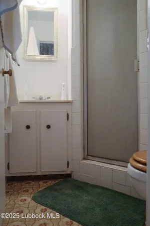 a view of an entryway with table and chair