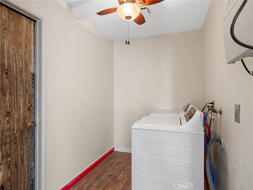 16986 Ocotilla Road Apple Valley, CA 92307 - Photo 14 of 39 a bathroom with a sink and washing machine