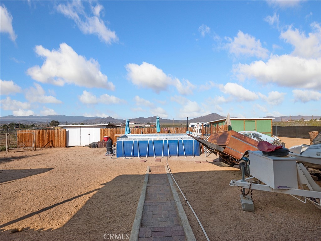 16986 Ocotilla Road Apple Valley, CA 92307 - Photo 26 of 39 a view of a terrace with chairs