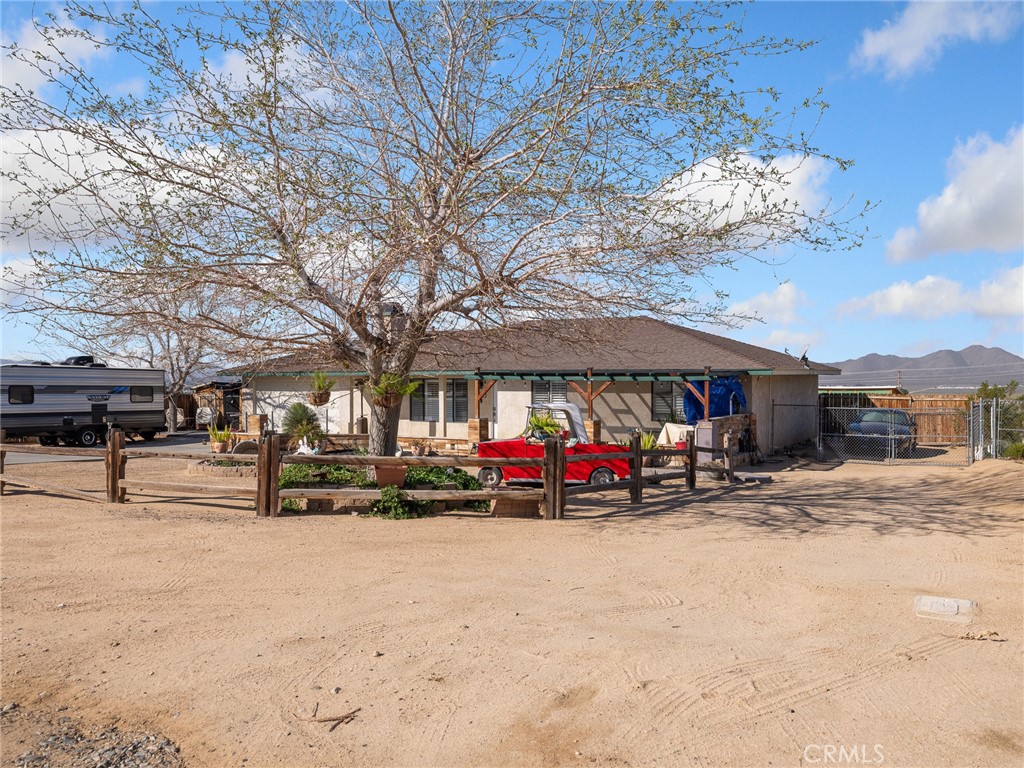 16986 Ocotilla Road Apple Valley, CA 92307 - Photo 3 of 39 a view of street with parked cars