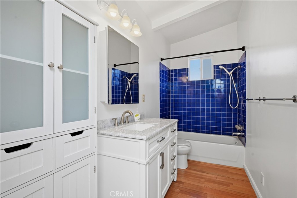 13701 Arrowhead Road Clearlake, CA 95422 - Photo 9 of 21 Bathroom has carerra marble countertop, tile shower.