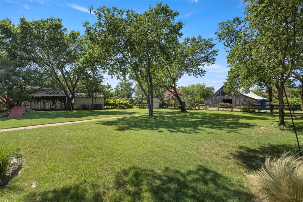 7090 Maple Street Frisco, TX 75033 - Photo 7 of 40 spacious backyard overlooking neighboring original barn
