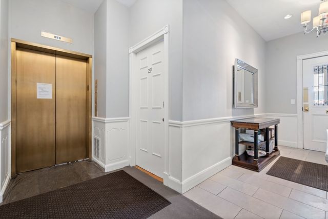 a view of a livingroom with furniture and windows