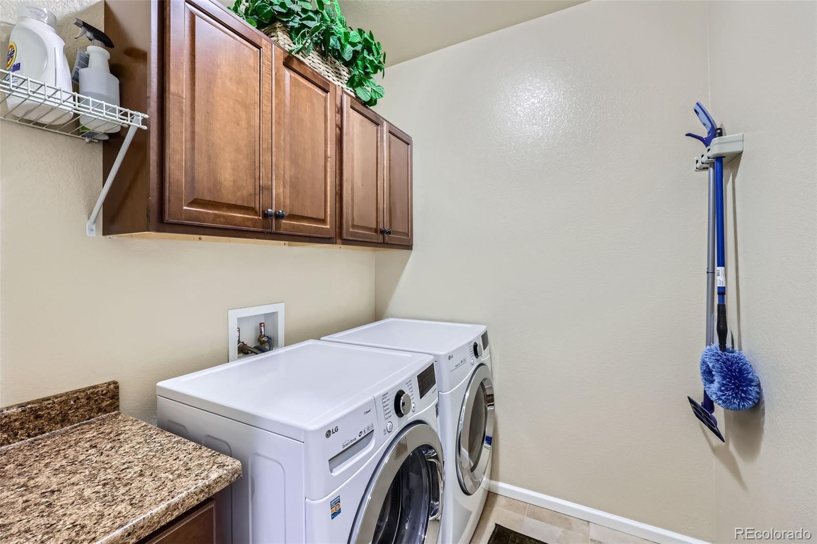 2872 Dreamcatcher Loop Castle Rock, CO 80109 - Photo 33 of 42 a utility room with dryer and washer