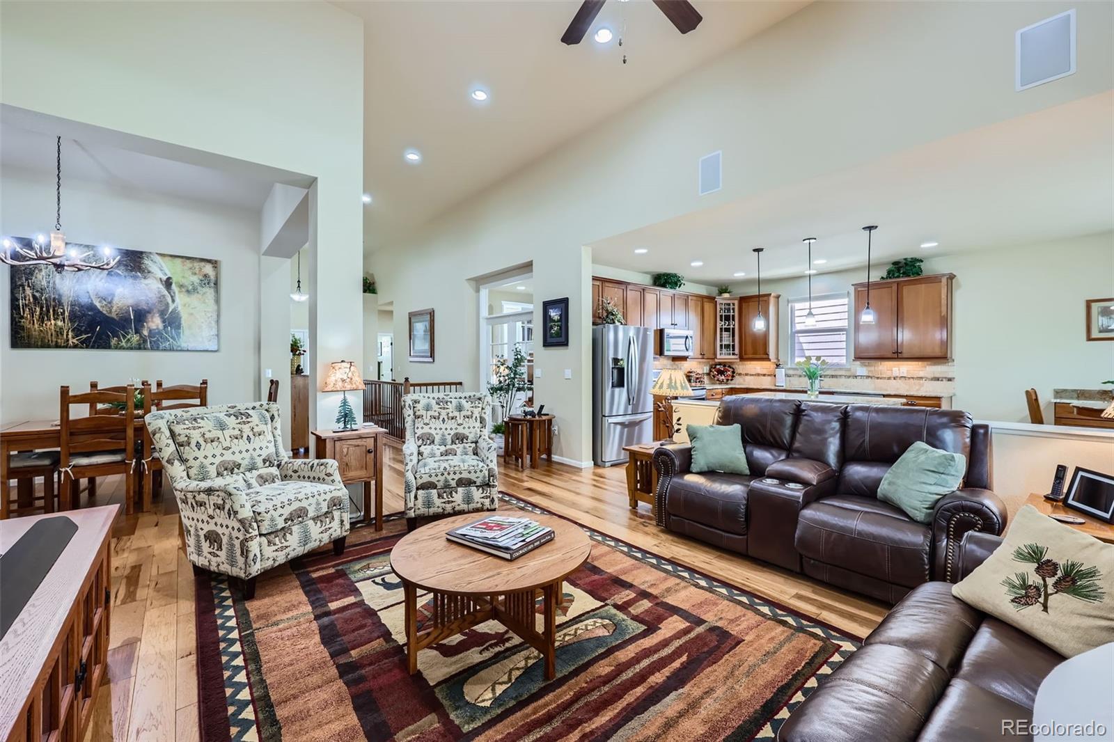 2872 Dreamcatcher Loop Castle Rock, CO 80109 - Photo 7 of 42 a living room with furniture and a flat screen tv
