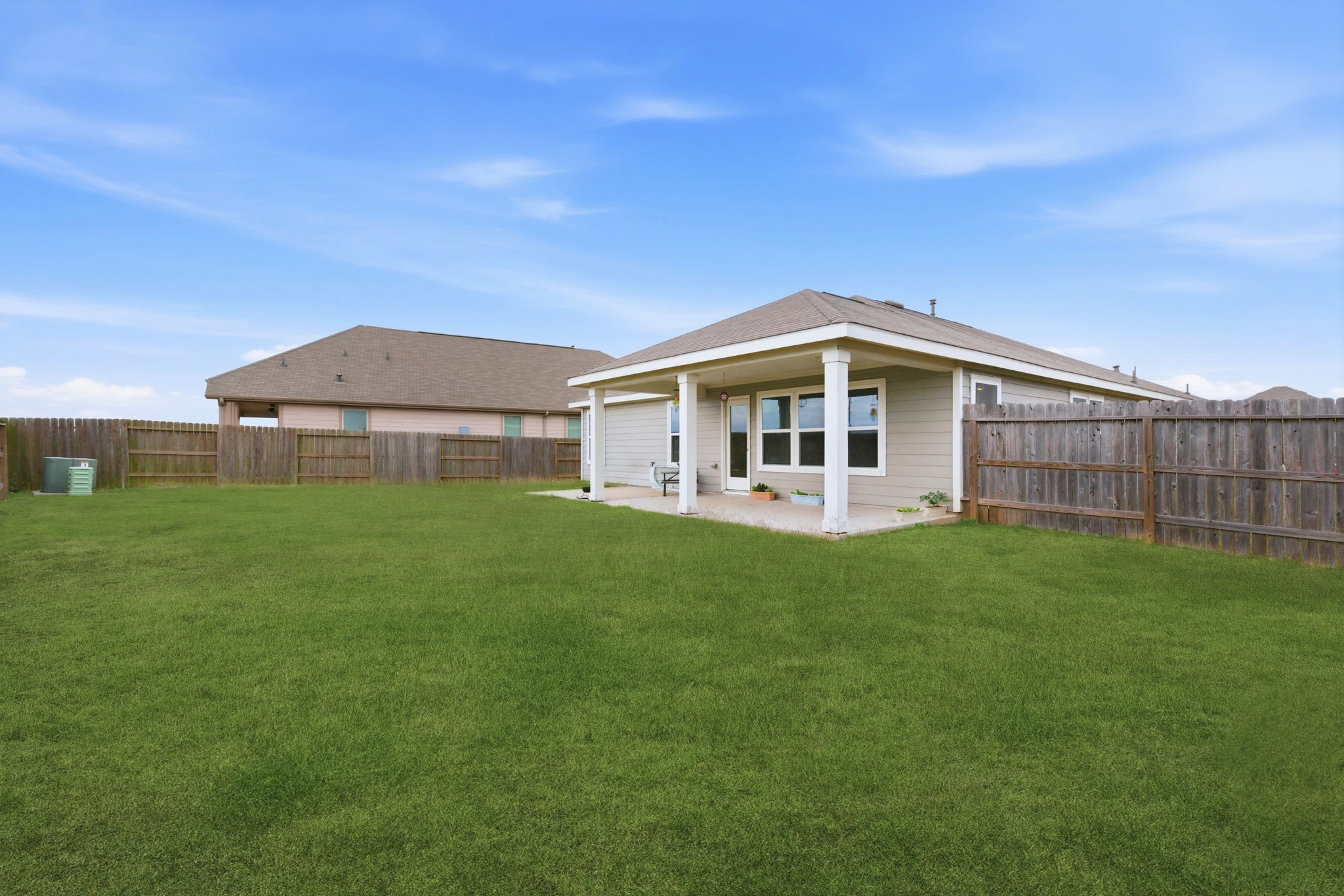 2607 Little Bluestem Lane Rosenberg, TX 77469 - Photo 16 of 20 a view of a house with a backyard