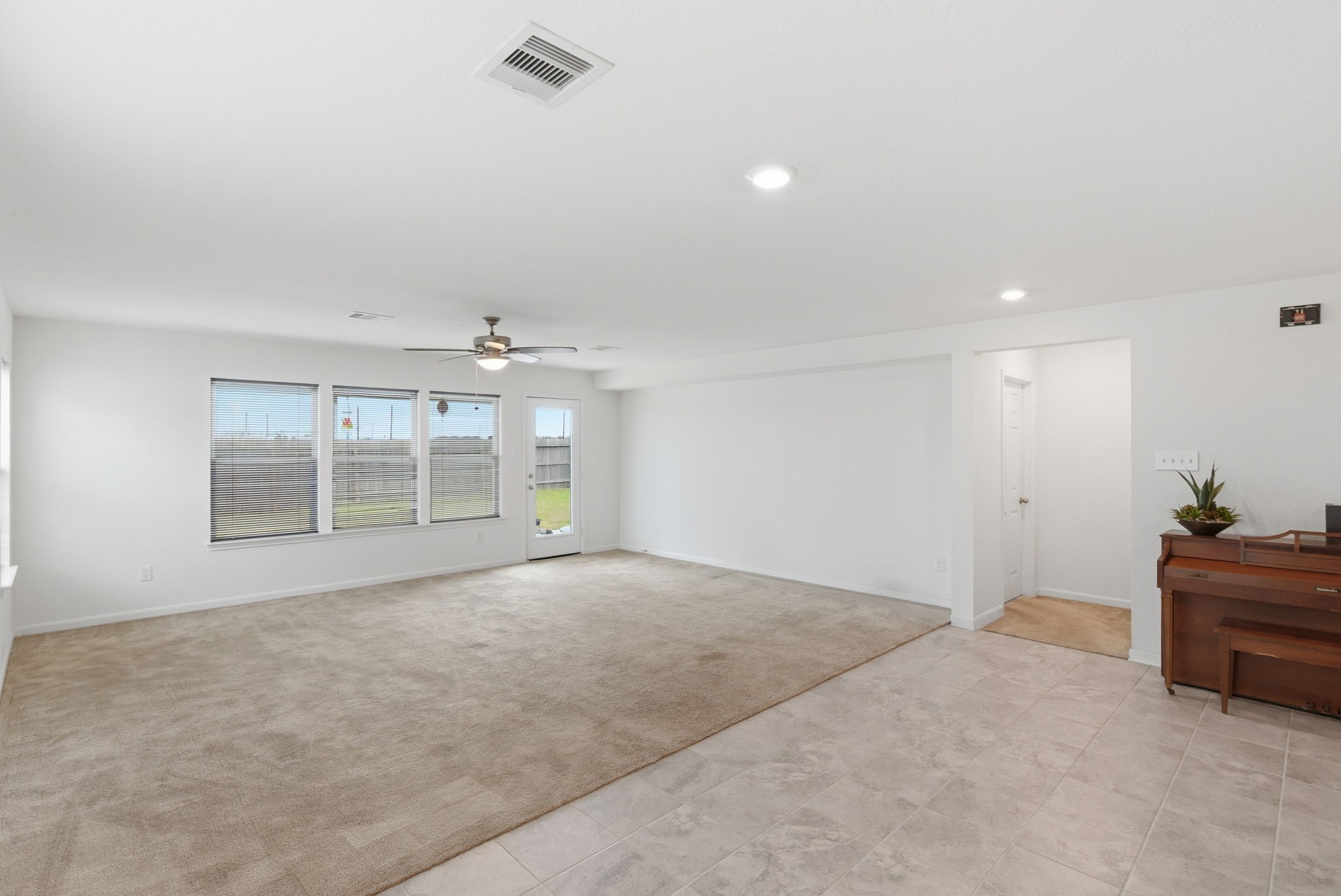 2607 Little Bluestem Lane Rosenberg, TX 77469 - Photo 9 of 20 a view of an empty room with a window