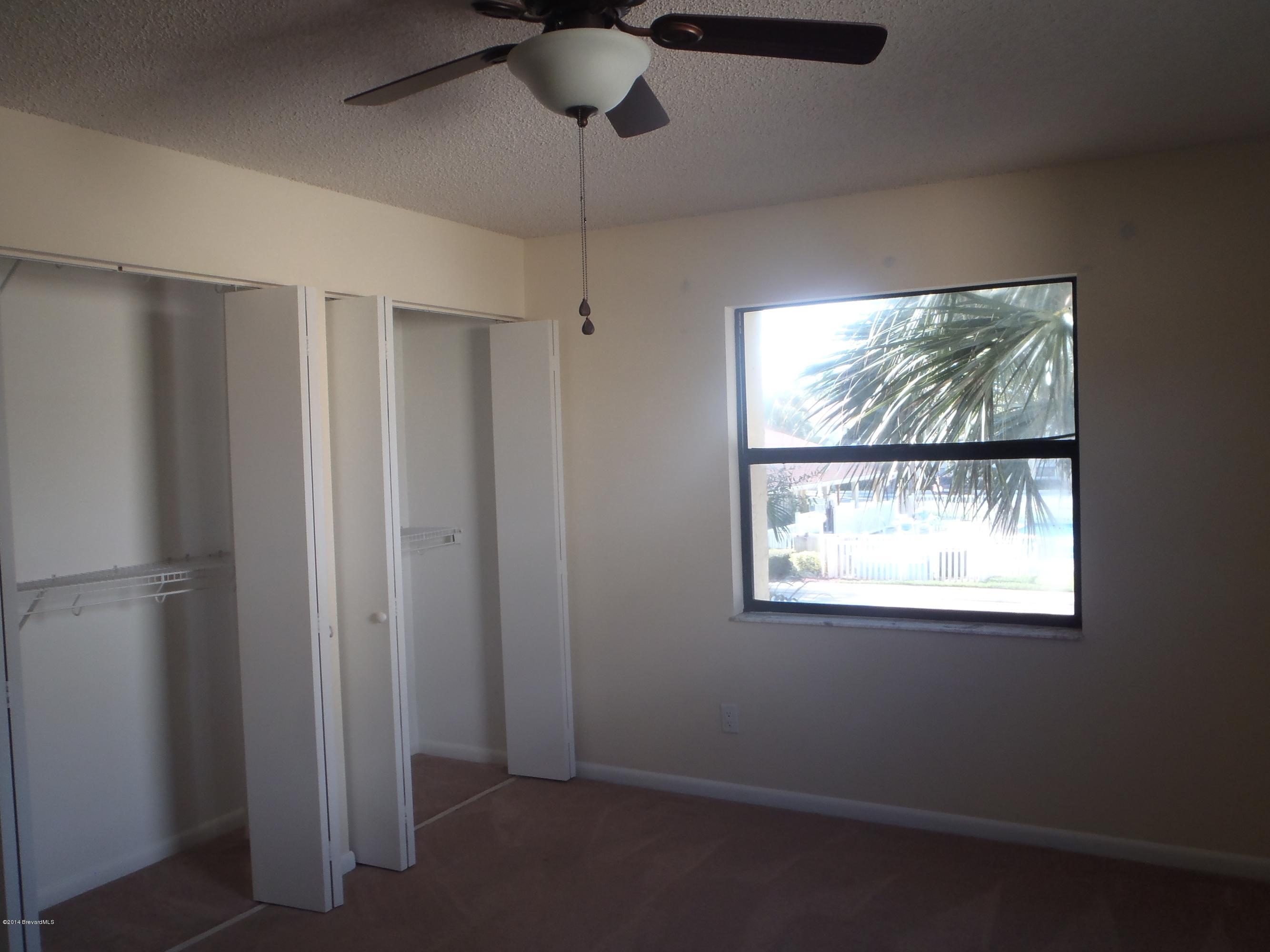 594 North Wickham Road, Unit 8 Melbourne, FL 32935 - Photo 8 of 9 Master Bedroom