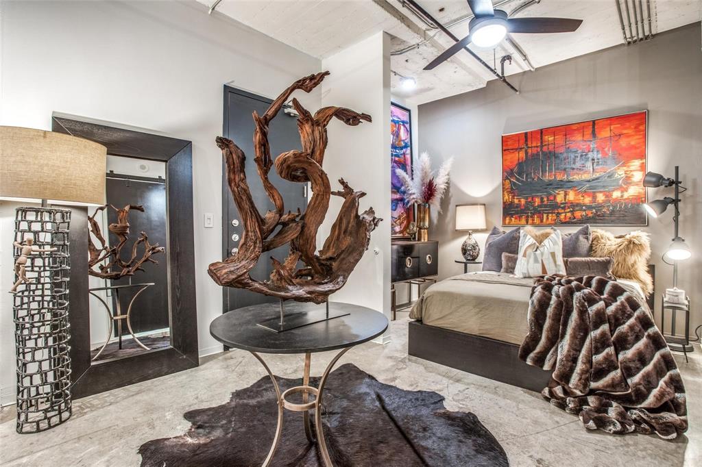 1122 Jackson Street, Unit 322 Dallas, TX 75202 - Photo 15 of 25 a view of a room with gym equipment