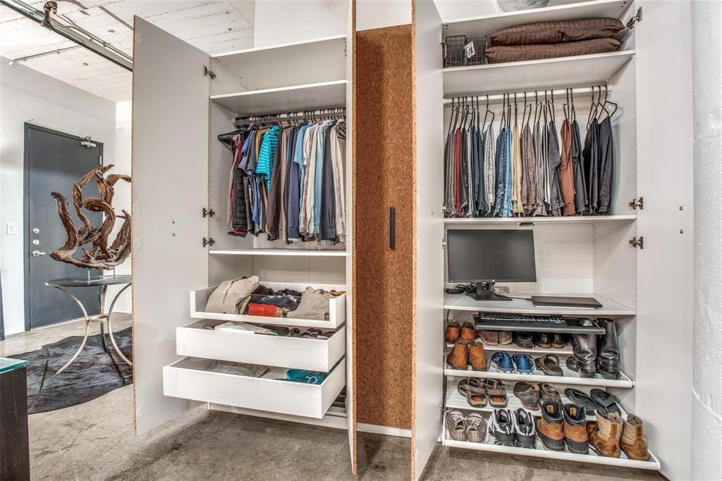 1122 Jackson Street, Unit 322 Dallas, TX 75202 - Photo 20 of 25 a view of walk in closet with clothes and shoes