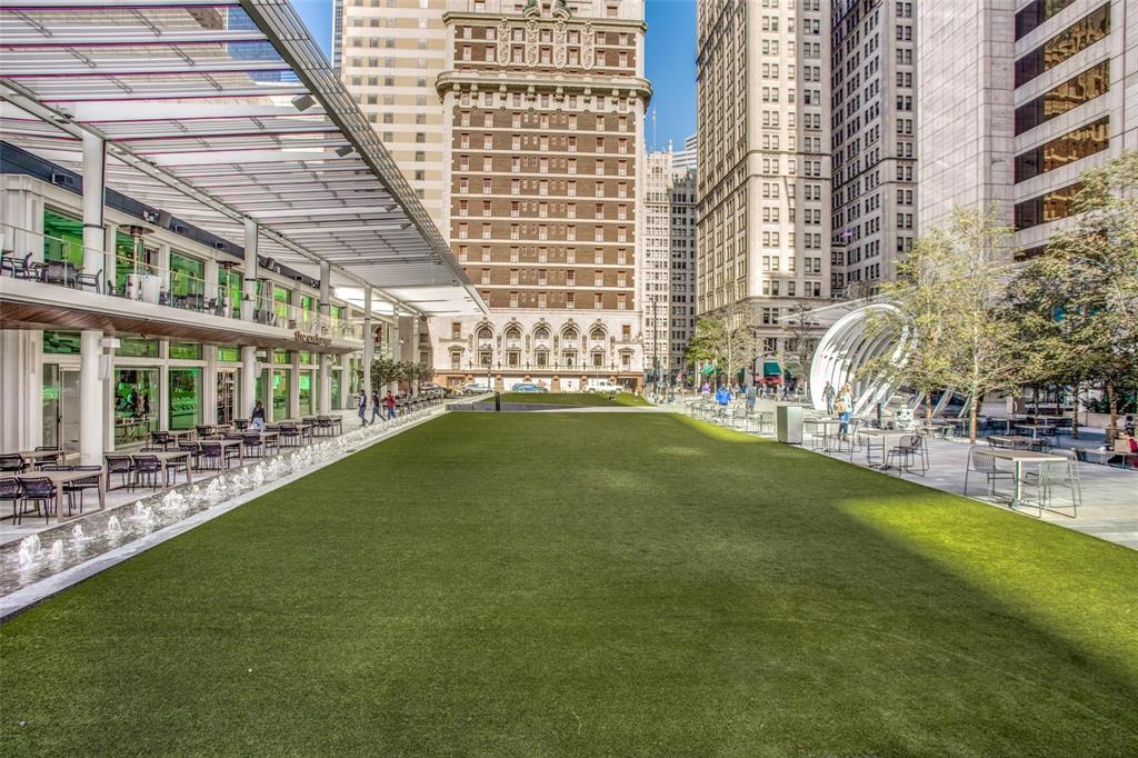 1122 Jackson Street, Unit 322 Dallas, TX 75202 - Photo 24 of 25 a view of yard with swimming pool outdoor seating