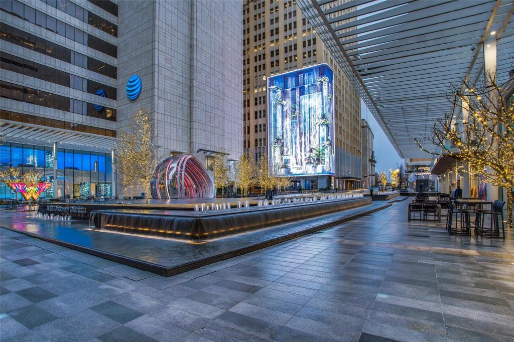 1122 Jackson Street, Unit 322 Dallas, TX 75202 - Photo 25 of 25 a living room with furniture and wooden floor