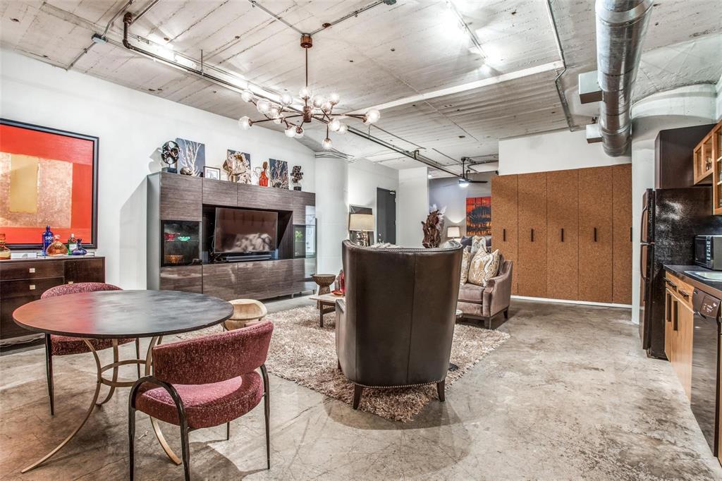 1122 Jackson Street, Unit 322 Dallas, TX 75202 - Photo 9 of 25 a view of a dining room with furniture