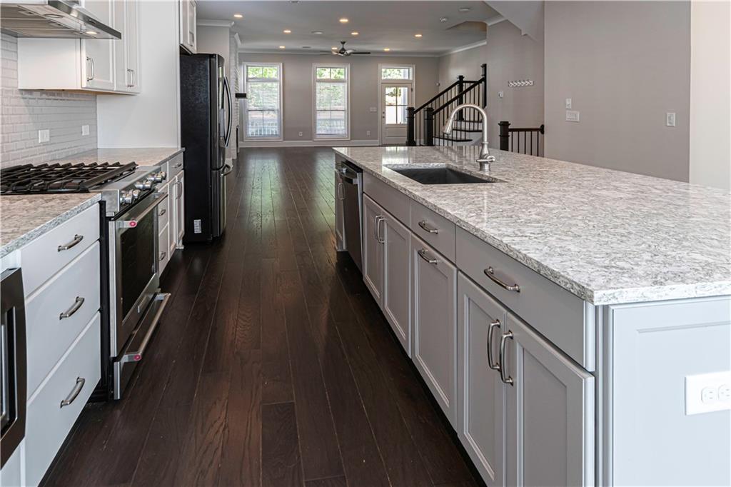 2006 Attell Way Decatur, GA 30033 - Photo 11 of 35 a kitchen with stainless steel appliances granite countertop a stove and a refrigerator