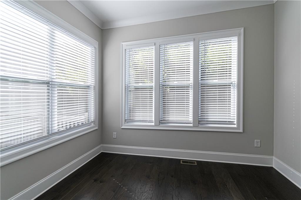 2006 Attell Way Decatur, GA 30033 - Photo 13 of 35 a view of an empty room with wooden floor and a window