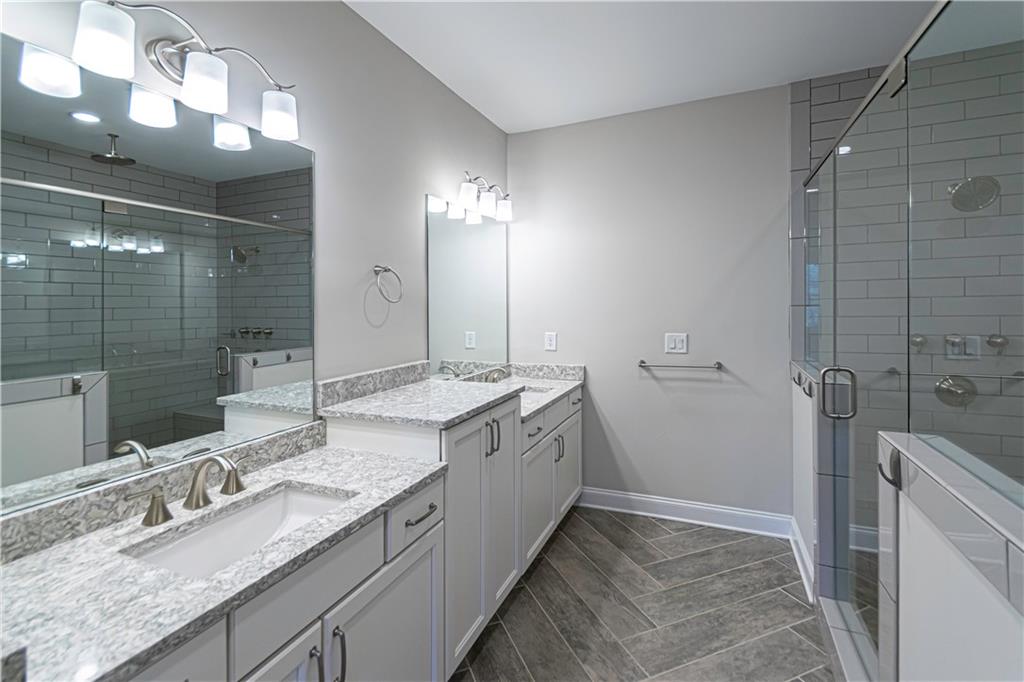 2006 Attell Way Decatur, GA 30033 - Photo 19 of 35 a bathroom with a granite countertop sink mirror and double