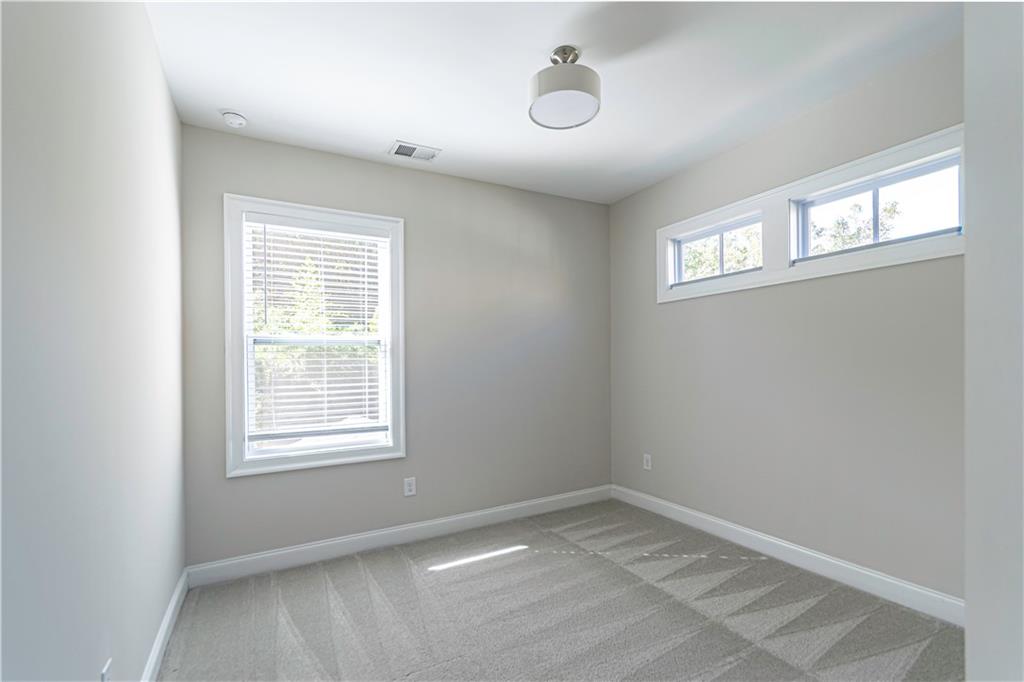 2006 Attell Way Decatur, GA 30033 - Photo 24 of 35 an empty room with windows