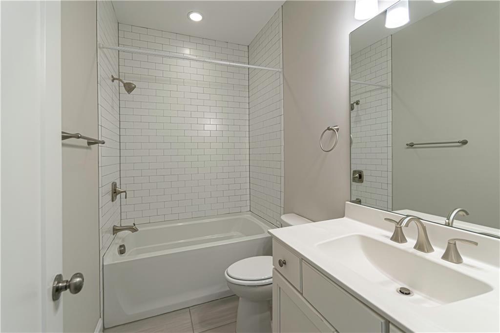 2006 Attell Way Decatur, GA 30033 - Photo 25 of 35 a bathroom with a sink toilet and shower