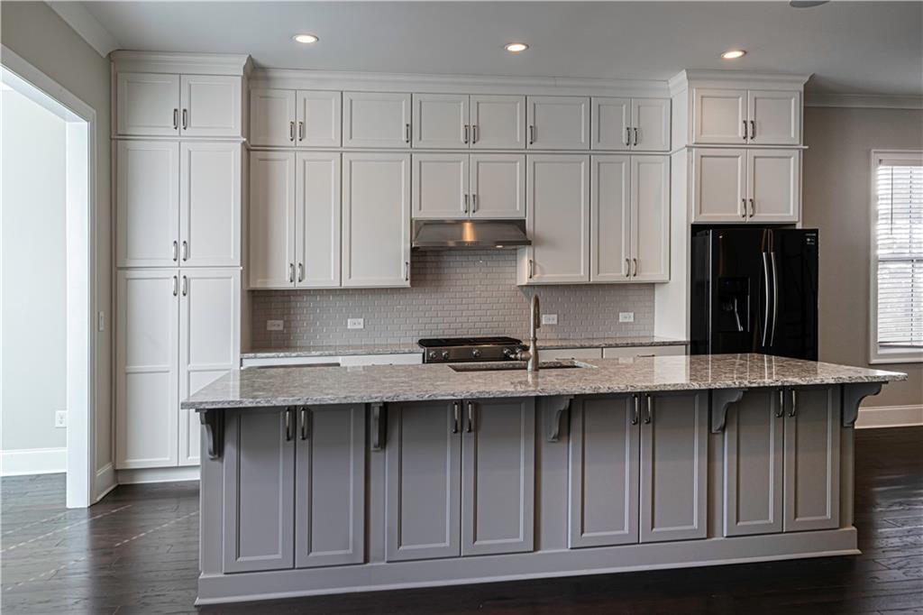 2006 Attell Way Decatur, GA 30033 - Photo 9 of 35 a kitchen with stainless steel appliances granite countertop a refrigerator and cabinets