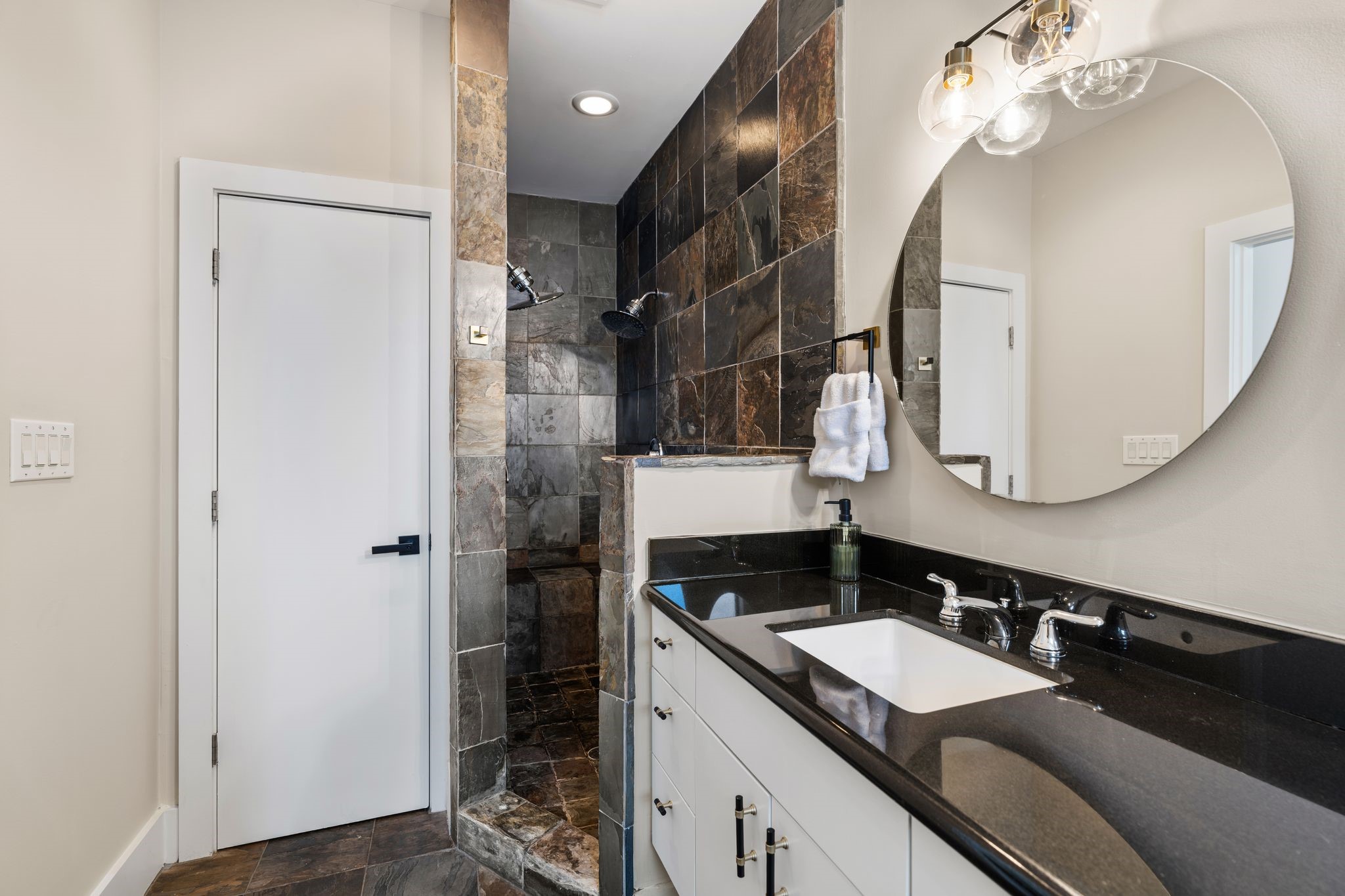 1039 Bonner Street, Unit 1039 Houston, TX 77007 - Photo 11 of 19 The primary bath features a large walk-in shower.
