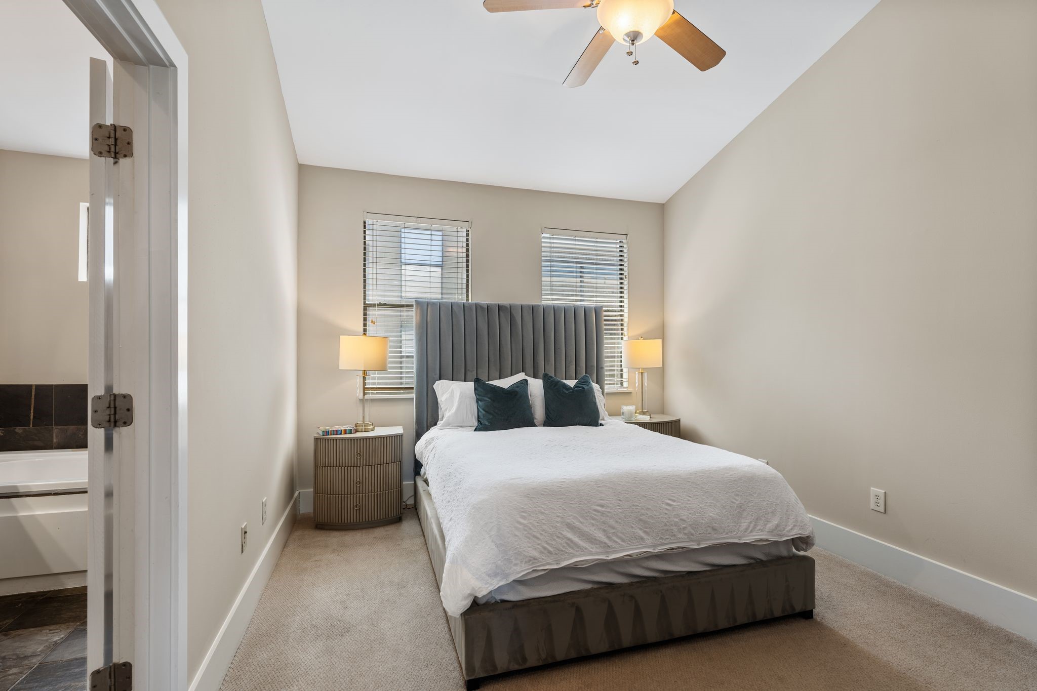 1039 Bonner Street, Unit 1039 Houston, TX 77007 - Photo 9 of 19 Nice sized primary bedroom with high ceilings and a huge walk in closet. 2nd floor. Also full size washer & dryer on 2nd floor.
