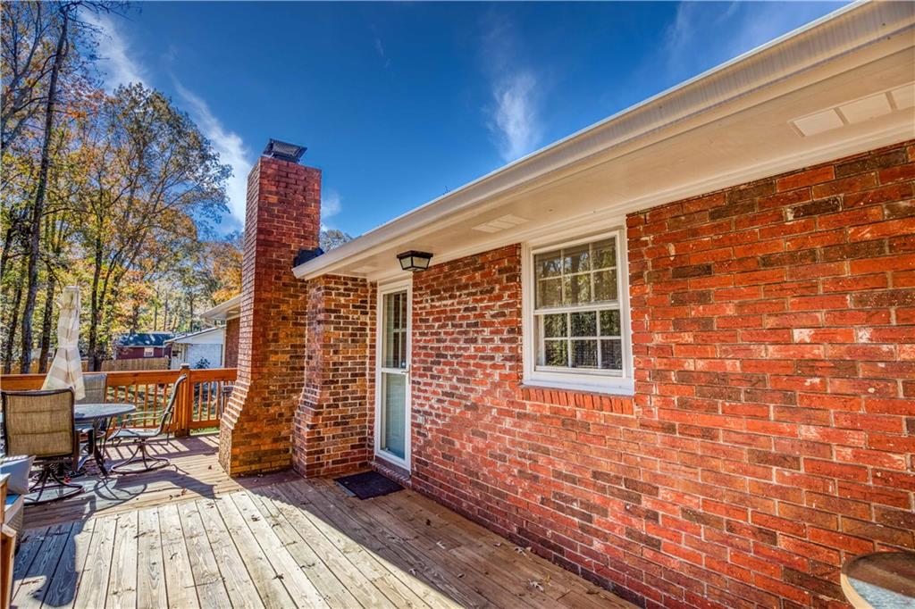 23 Woodland Road Auburn, GA 30011 - Photo 29 of 34 a view of a balcony with chairs
