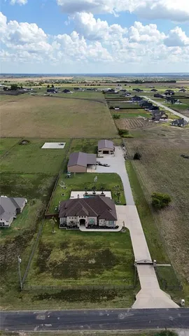 a view of a lake with a yard