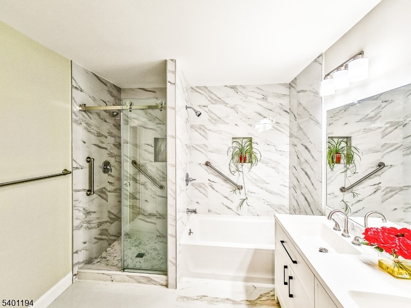 7B Rutland Lane Monroe Township, NJ 08831 - Photo 15 of 36 a bathroom with a bathtub and shower