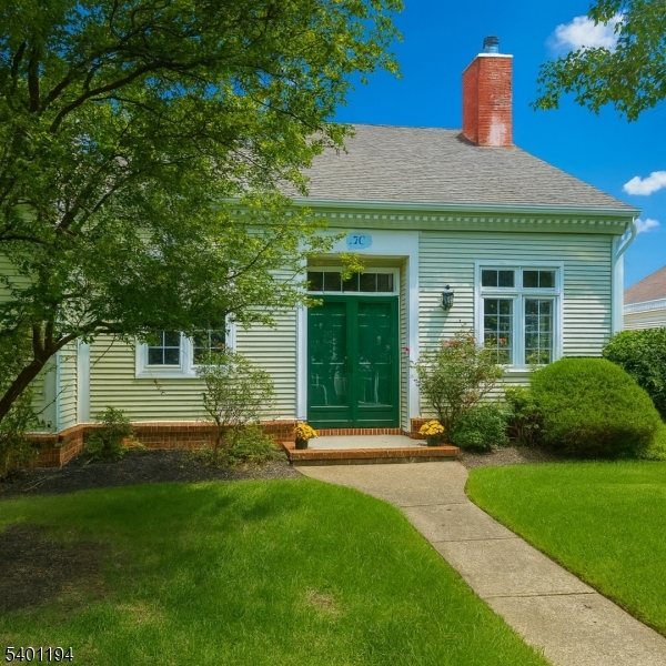 7B Rutland Lane Monroe Township, NJ 08831 - Photo 2 of 36 a front view of a house with a yard