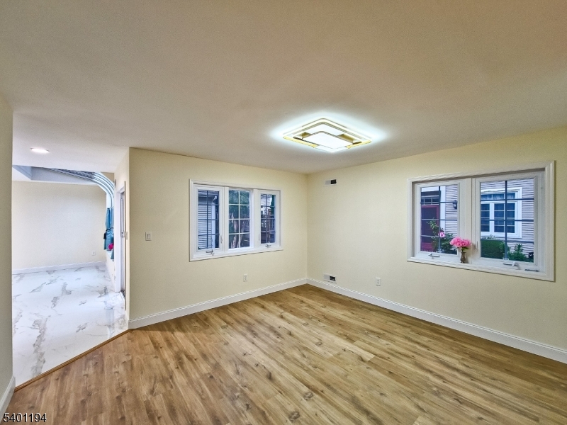 7B Rutland Lane Monroe Township, NJ 08831 - Photo 9 of 36 a view of livingroom with natural light