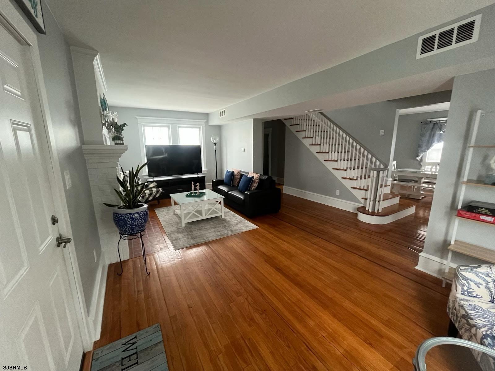205 Palermo Avenue Egg Harbor Township, NJ 08232 - Photo 2 of 7 a living room with furniture and wooden floor