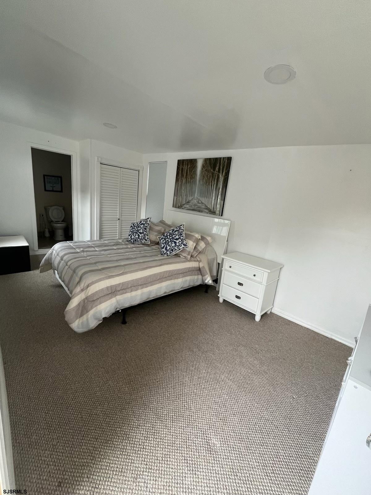 205 Palermo Avenue Egg Harbor Township, NJ 08232 - Photo 7 of 7 a spacious bedroom with a bed and window