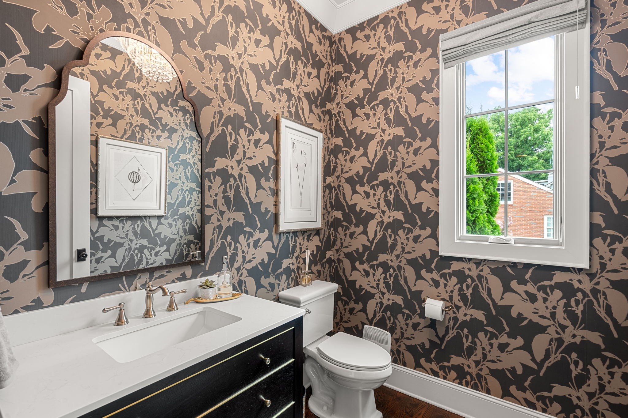 4031 Sneed Road Nashville, TN 37215 - Photo 16 of 61 a bathroom with a toilet sink and mirror