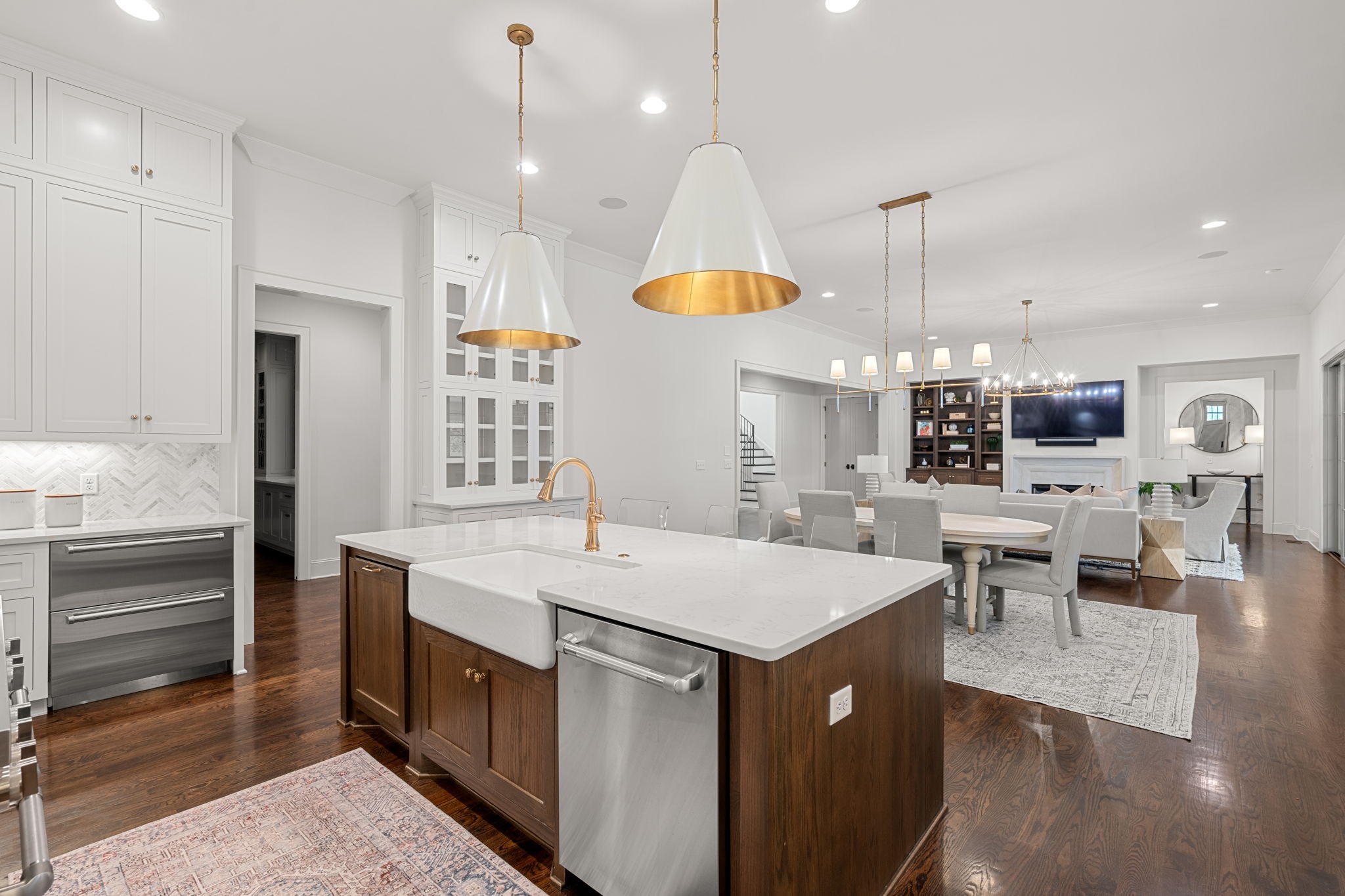 4031 Sneed Road Nashville, TN 37215 - Photo 21 of 61 a kitchen with a dining table chairs stainless steel appliances and cabinets