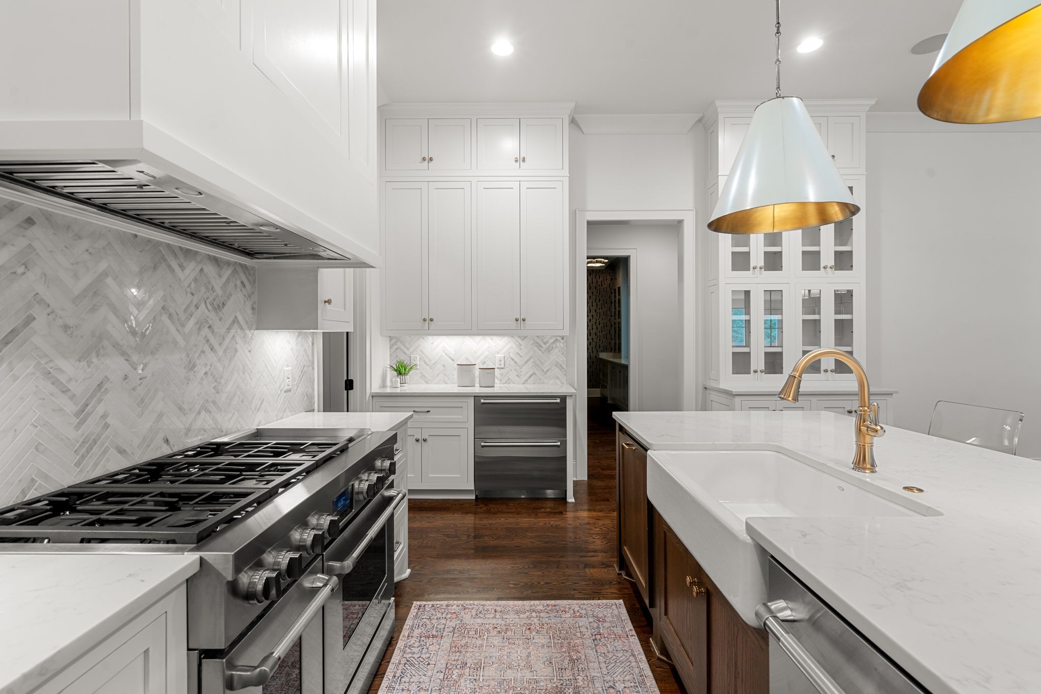 4031 Sneed Road Nashville, TN 37215 - Photo 22 of 61 a kitchen with a stove and a sink