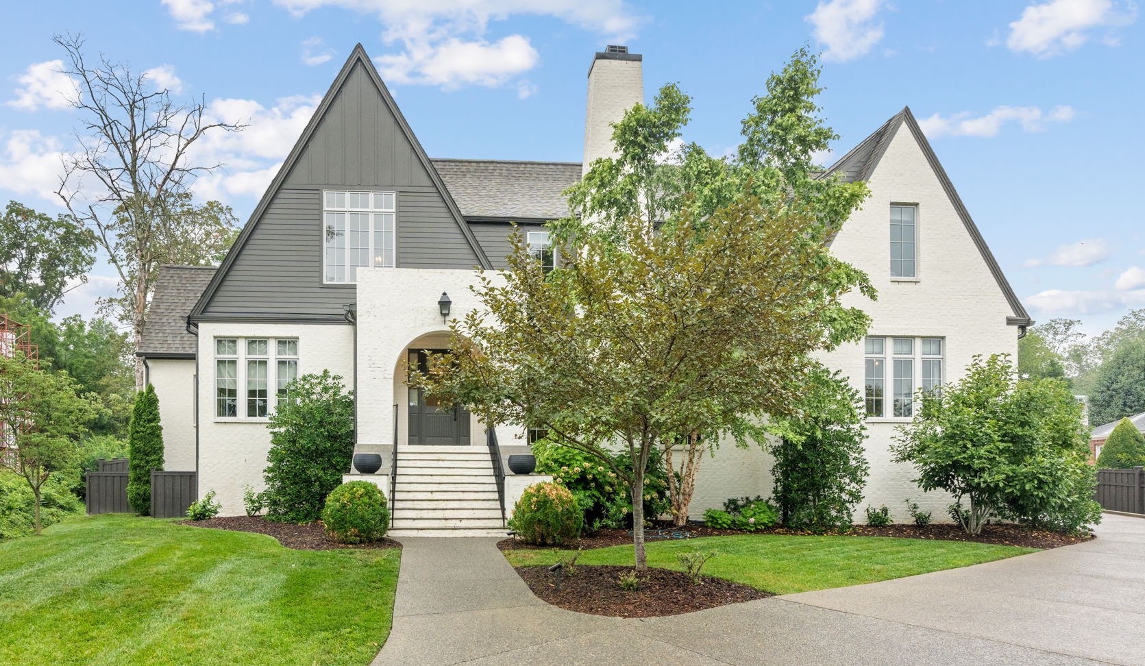 4031 Sneed Road Nashville, TN 37215 - Photo 3 of 61 a view of a house with a yard