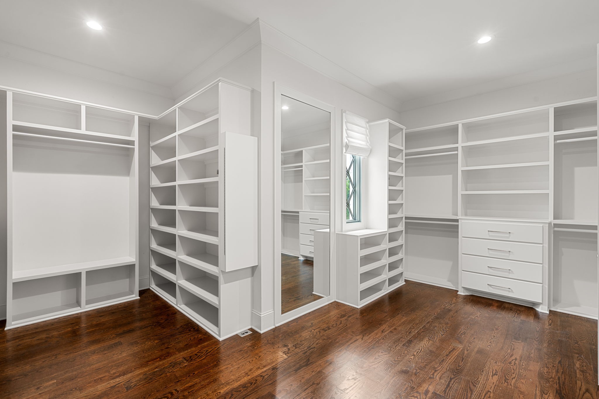 4031 Sneed Road Nashville, TN 37215 - Photo 31 of 61 a view of an empty room with wooden floor and closet