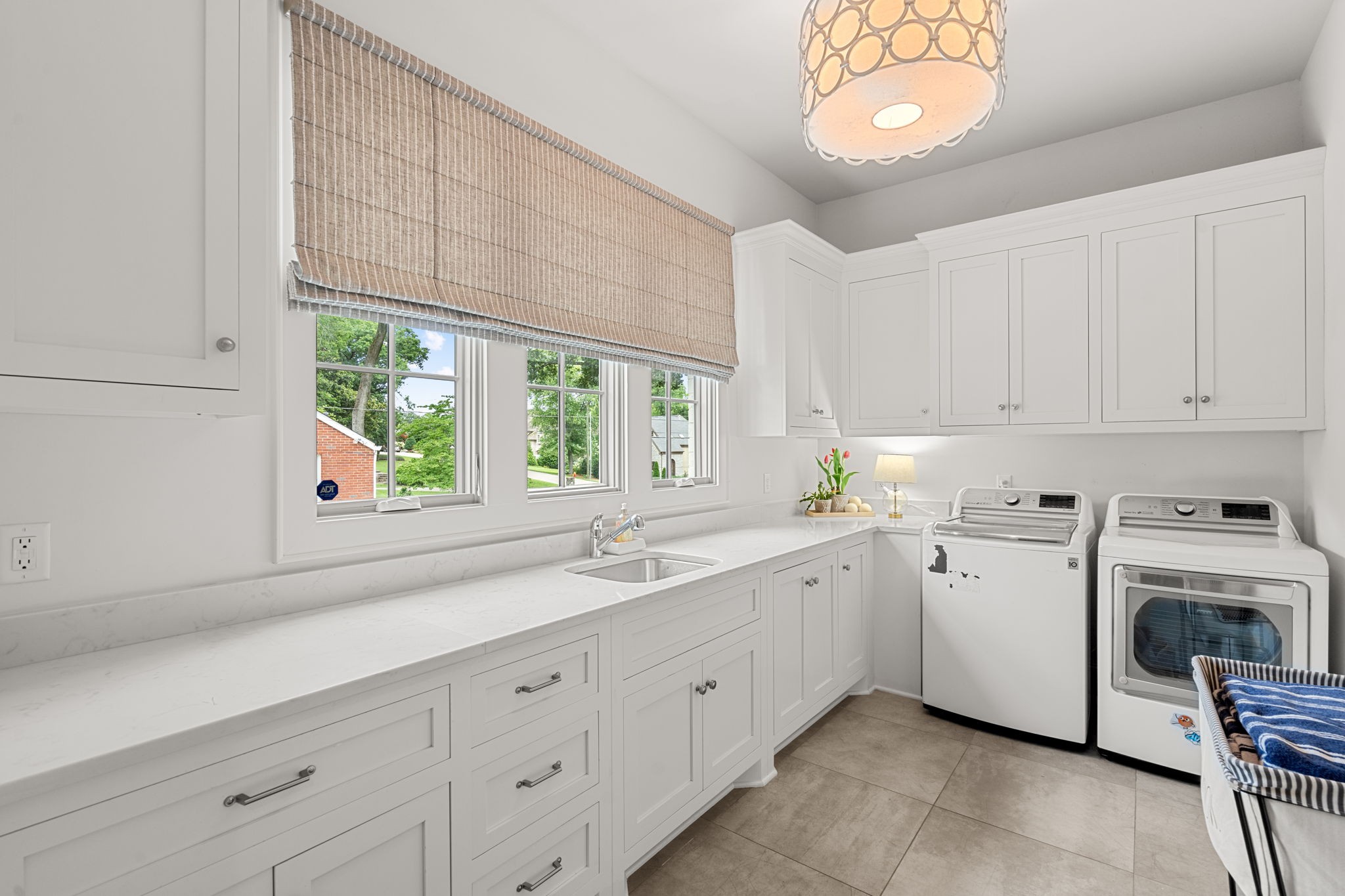 4031 Sneed Road Nashville, TN 37215 - Photo 36 of 61 a kitchen with a sink window and cabinets