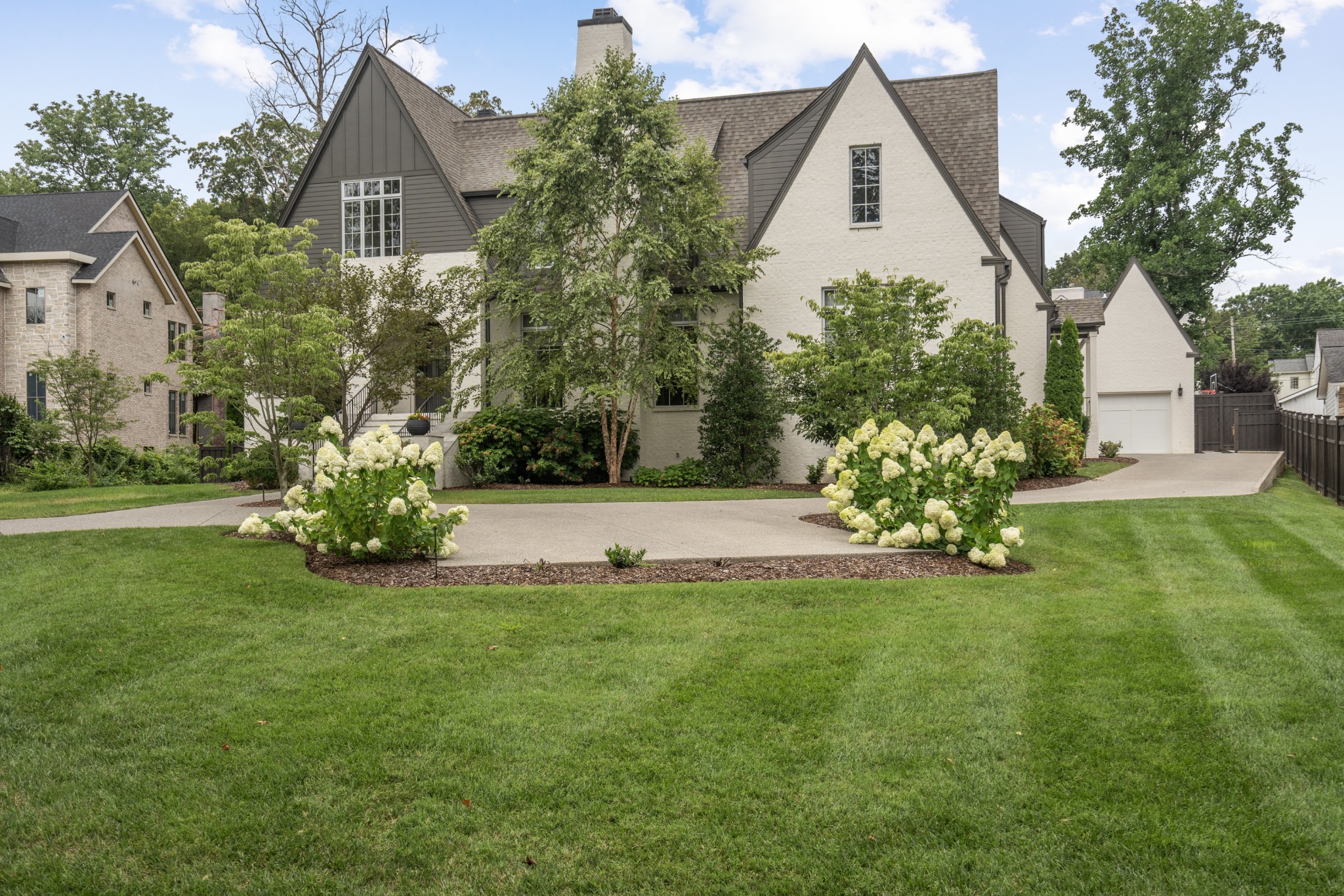 4031 Sneed Road Nashville, TN 37215 - Photo 4 of 61 a view of a house with a yard
