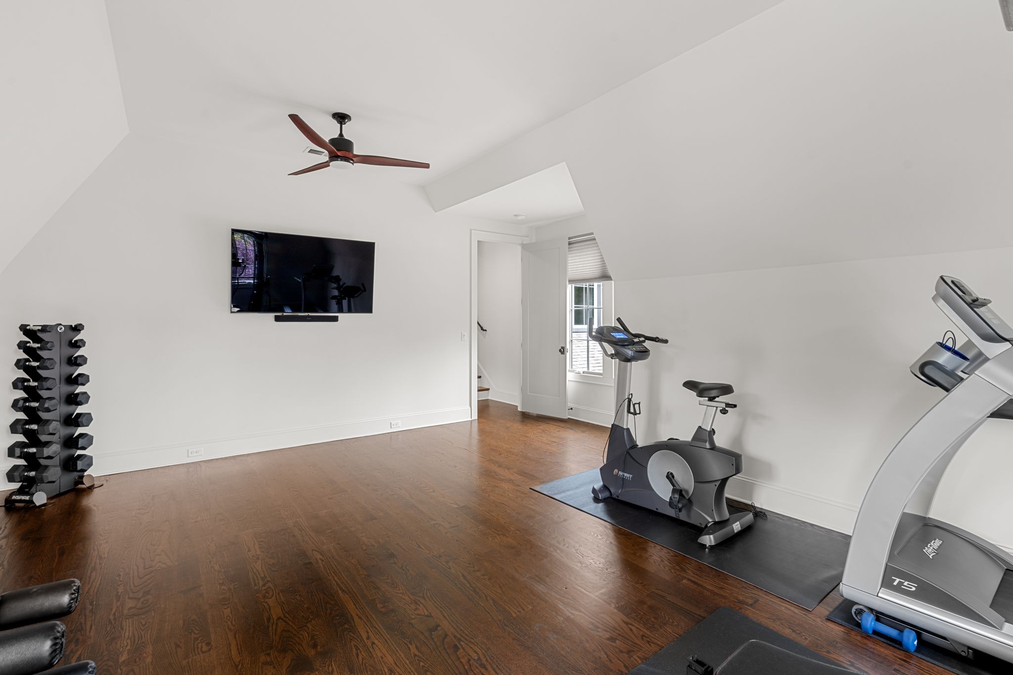 4031 Sneed Road Nashville, TN 37215 - Photo 44 of 61 a view of a livingroom with a flat screen tv and a couch