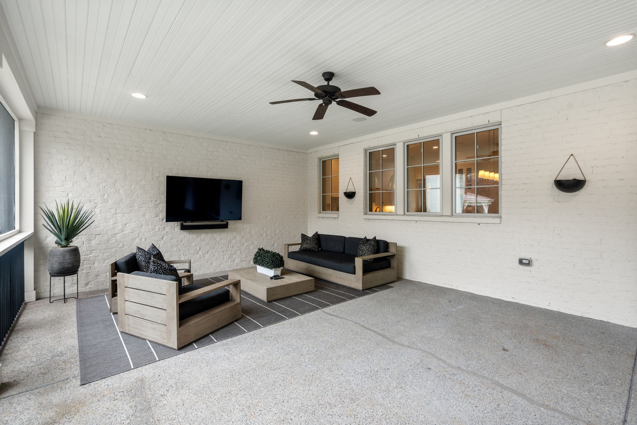 4031 Sneed Road Nashville, TN 37215 - Photo 47 of 61 a living room with furniture and a flat screen tv