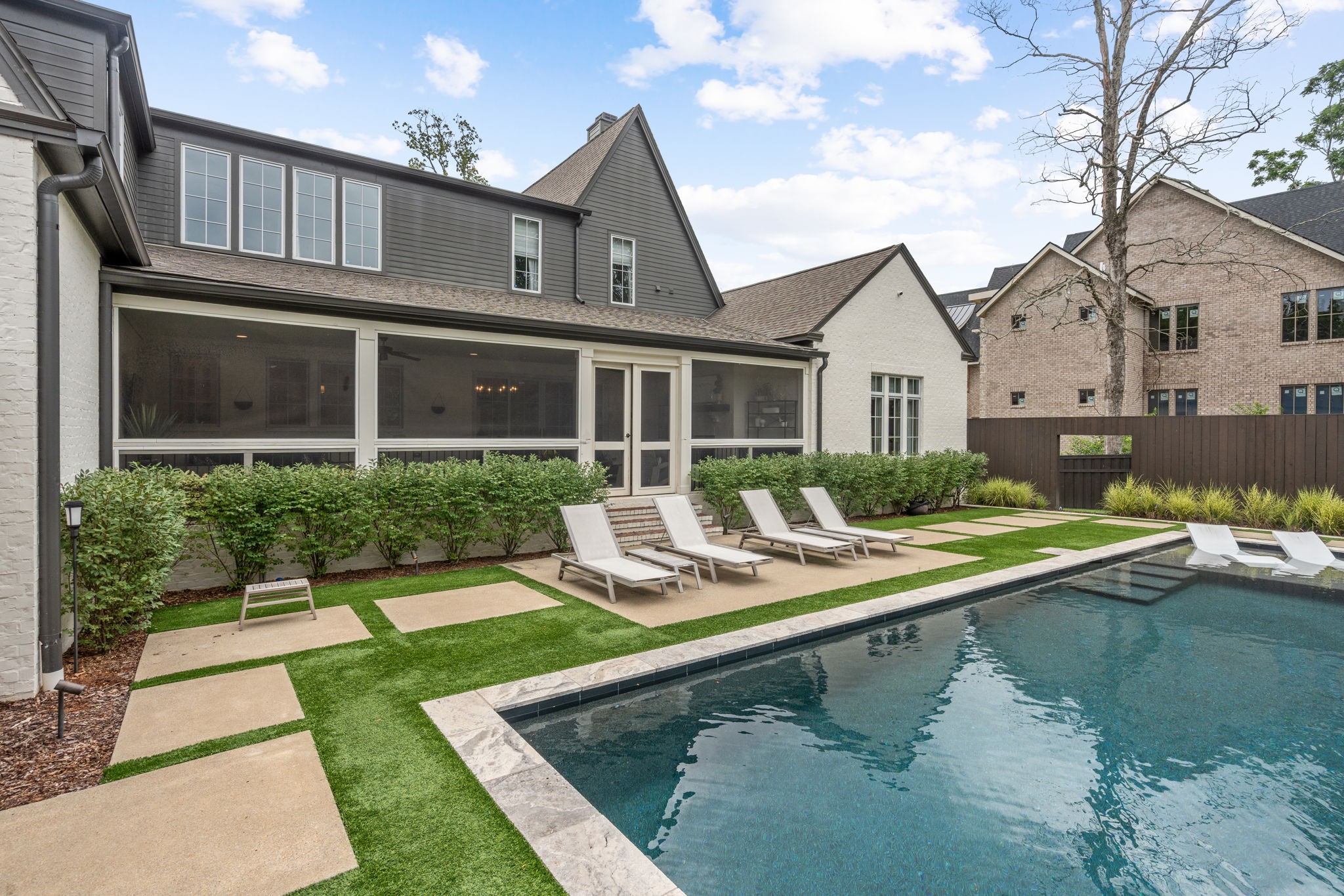 4031 Sneed Road Nashville, TN 37215 - Photo 51 of 61 a view of house with swimming pool outdoor seating